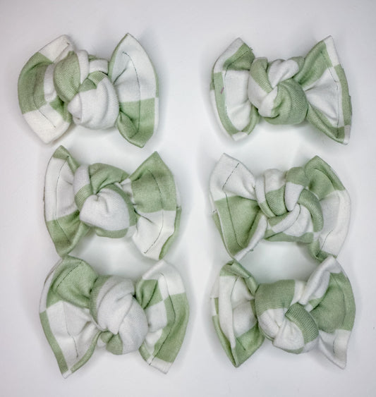 Checkered green and white piggies